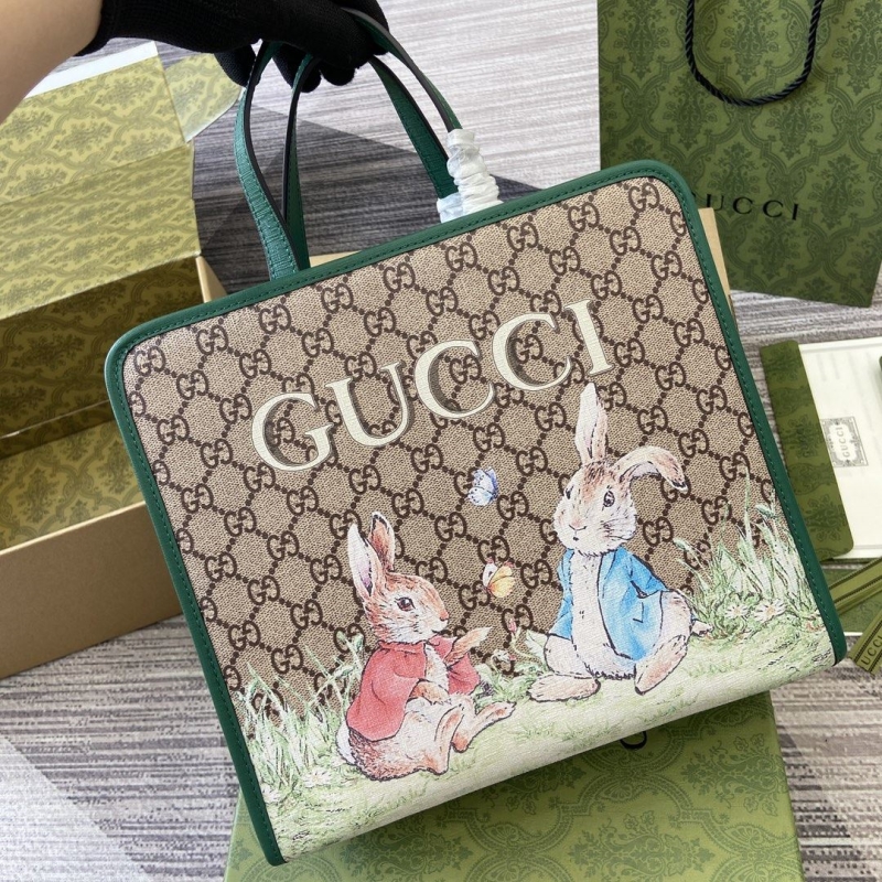 G*u*i shopping bags